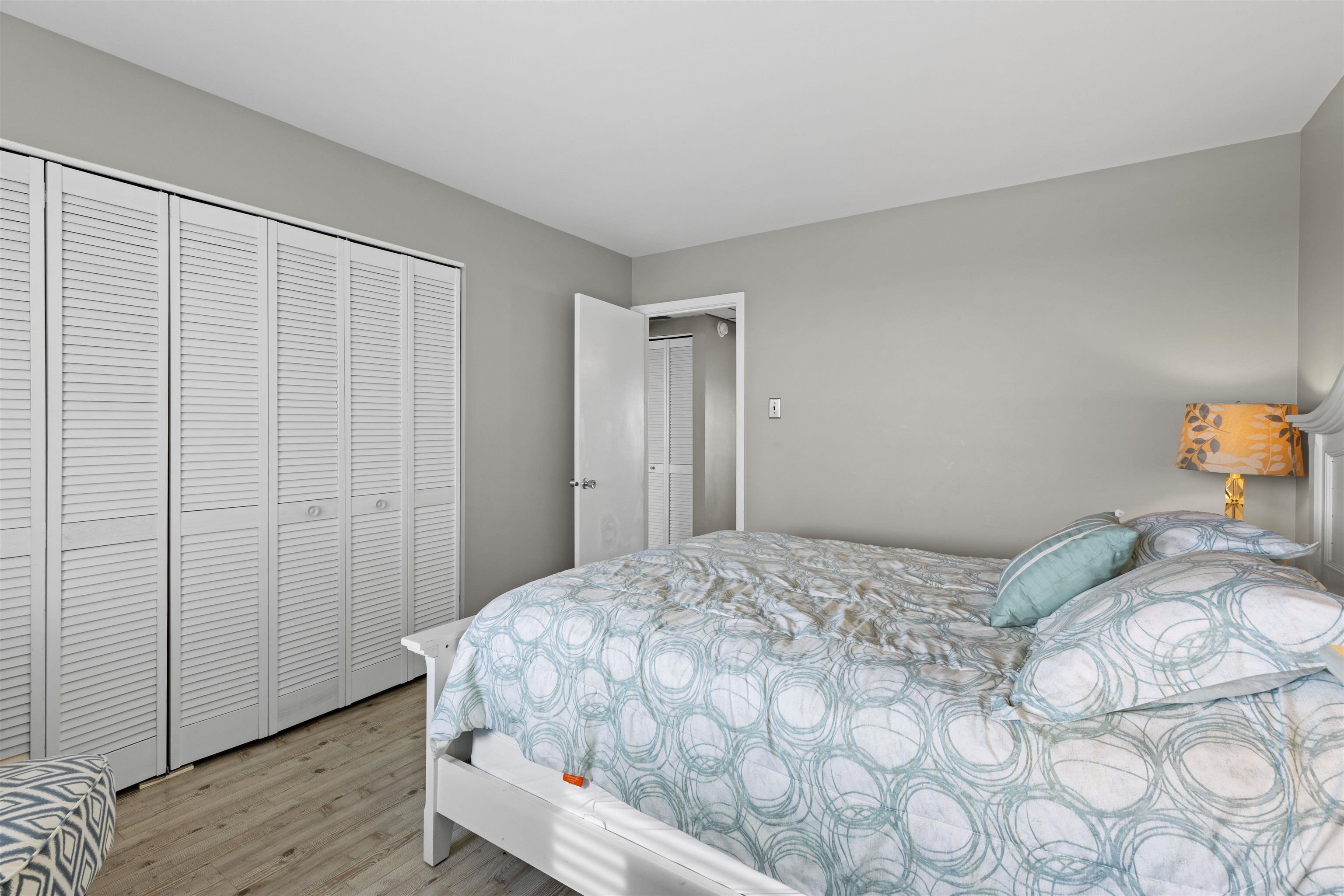 9 Jackson Street, Unit 506 Cape May, NJ 08204 - Photo 22 of 29 a bedroom with a bed and a window