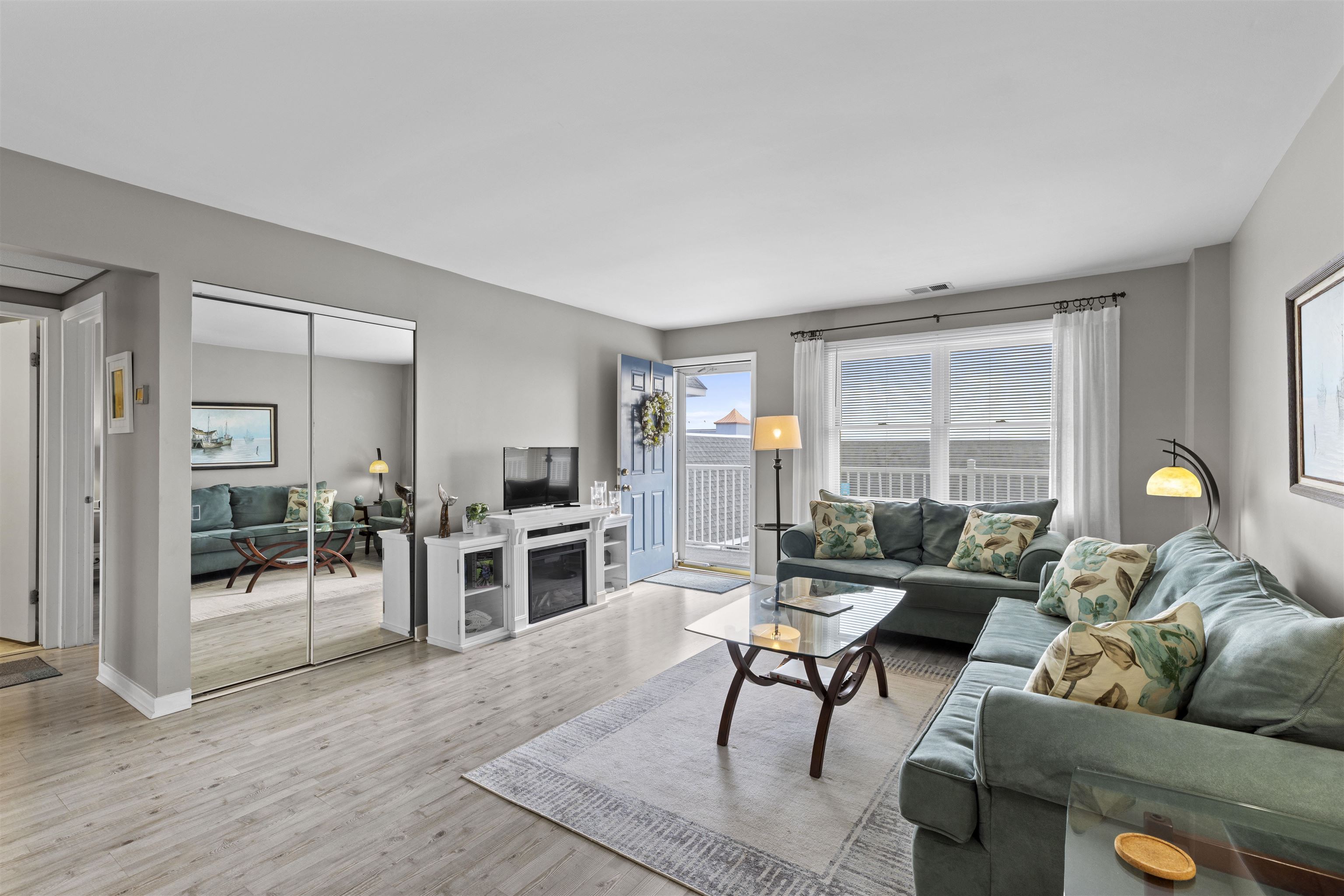 9 Jackson Street, Unit 506 Cape May, NJ 08204 - Photo 8 of 29 a living room with furniture and wooden floor