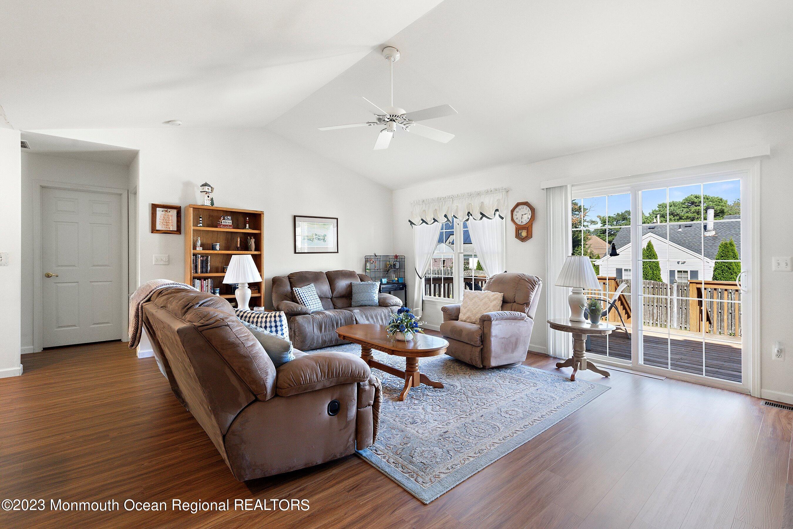 312 Leeward Road Manahawkin, NJ 08050 - Photo 12 of 25 a living room with furniture and wooden floor