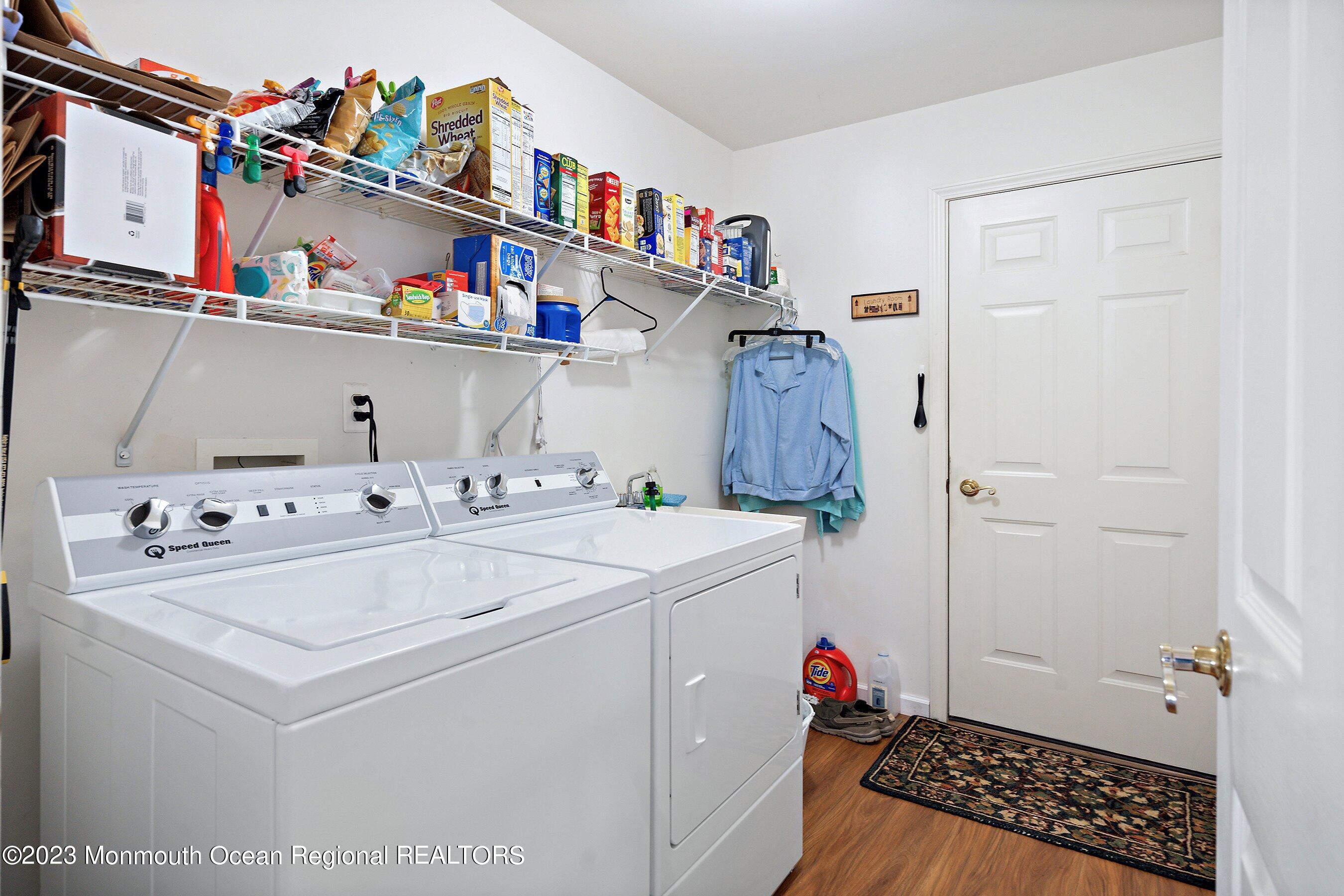 312 Leeward Road Manahawkin, NJ 08050 - Photo 21 of 25 a utility room with dryer and washer