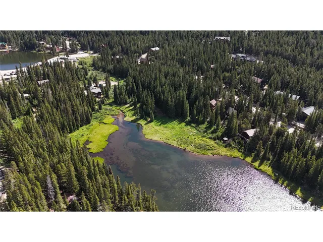 a balcony with a book shelf