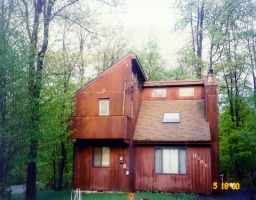 0 Turtle Lane Tobyhanna, PA 18466 - Photo 1 of 1 a view of a house with a yard and wooden fence
