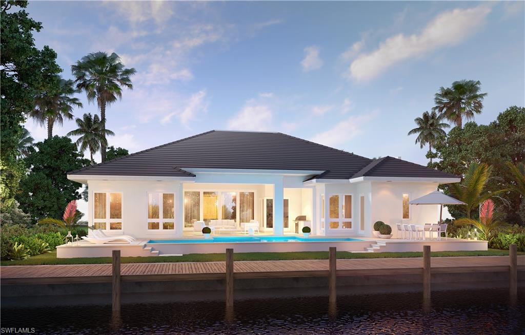 2165 Tarpon Road Naples, FL 34102 - Photo 5 of 24 a view of house with a garden