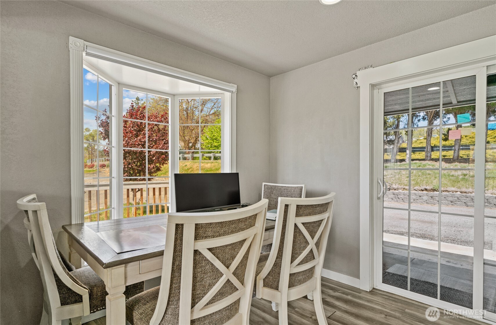 2440 Rock Island Road East Wenatchee, WA 98802 - Photo 12 of 37 a view of a dining room with furniture and a window