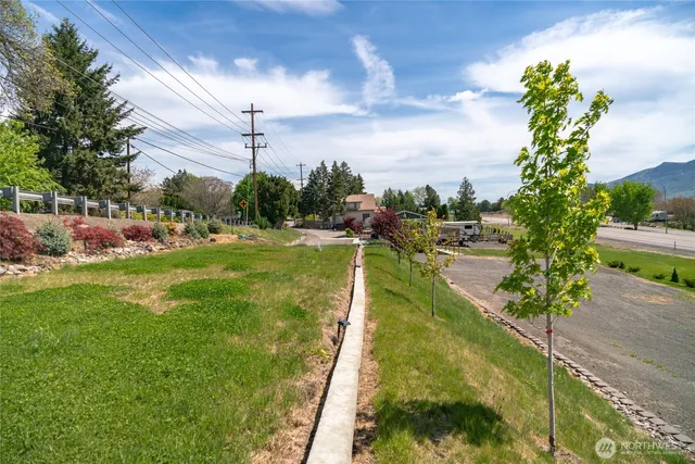 a view of a lake with a big yard