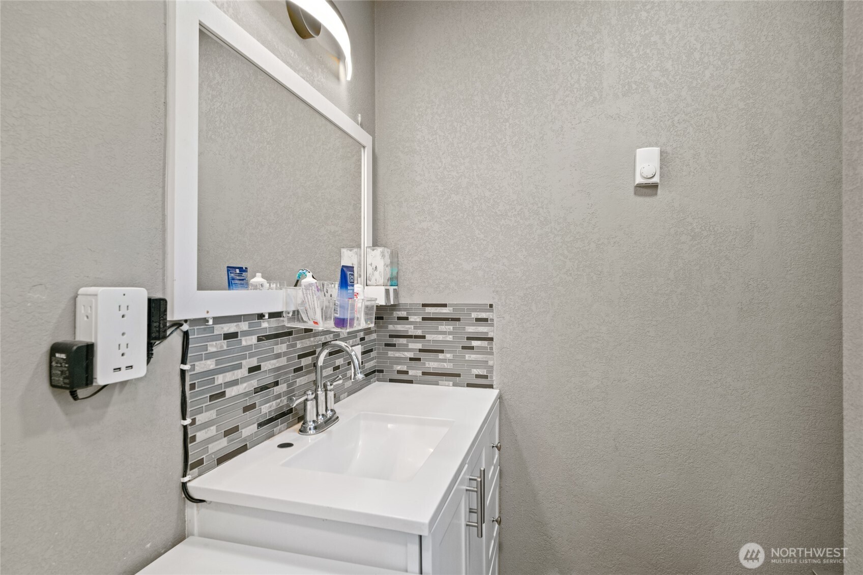 2440 Rock Island Road East Wenatchee, WA 98802 - Photo 24 of 37 a bathroom with a sink and a mirror