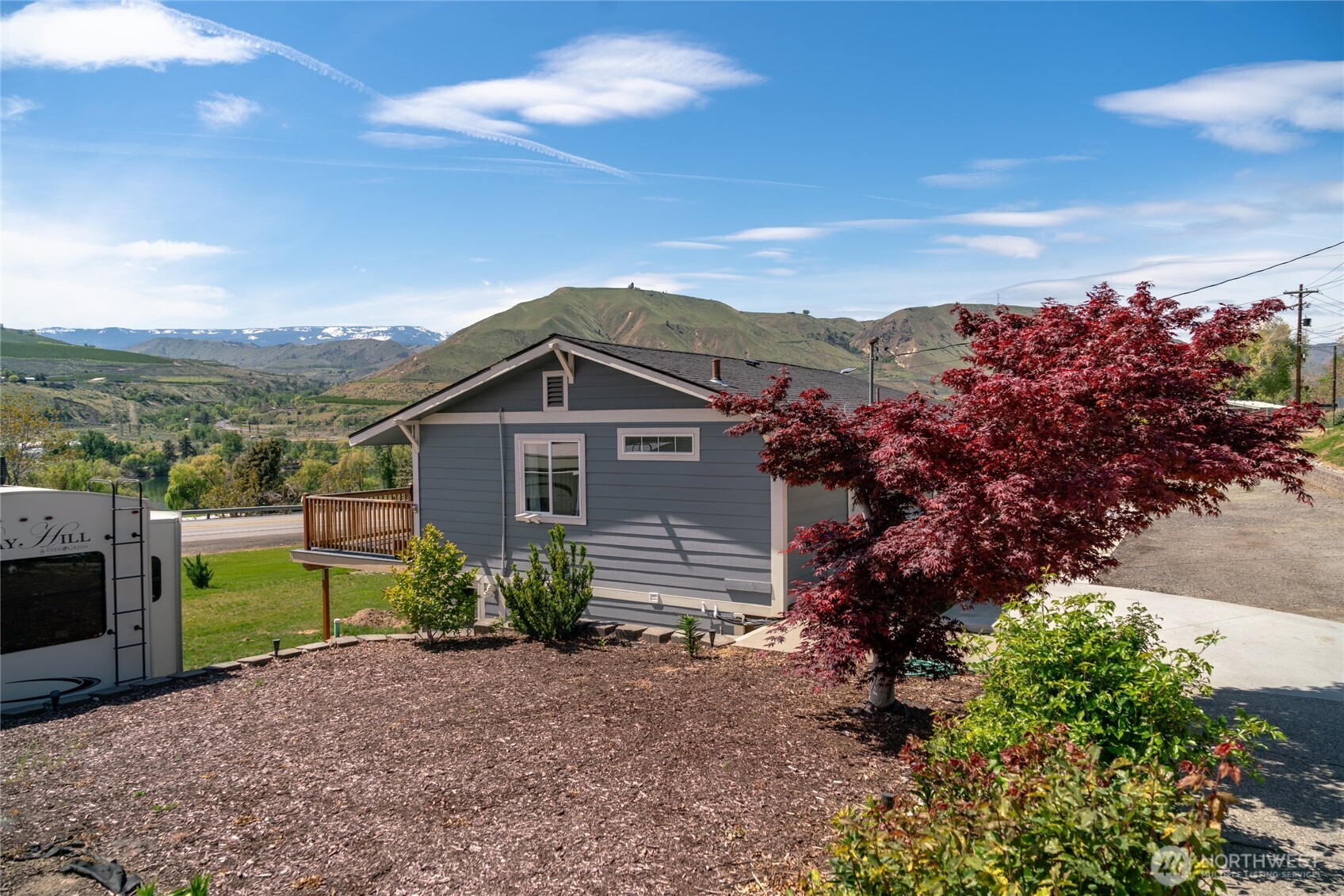 2440 Rock Island Road East Wenatchee, WA 98802 - Photo 35 of 37 a view of a house with a yard