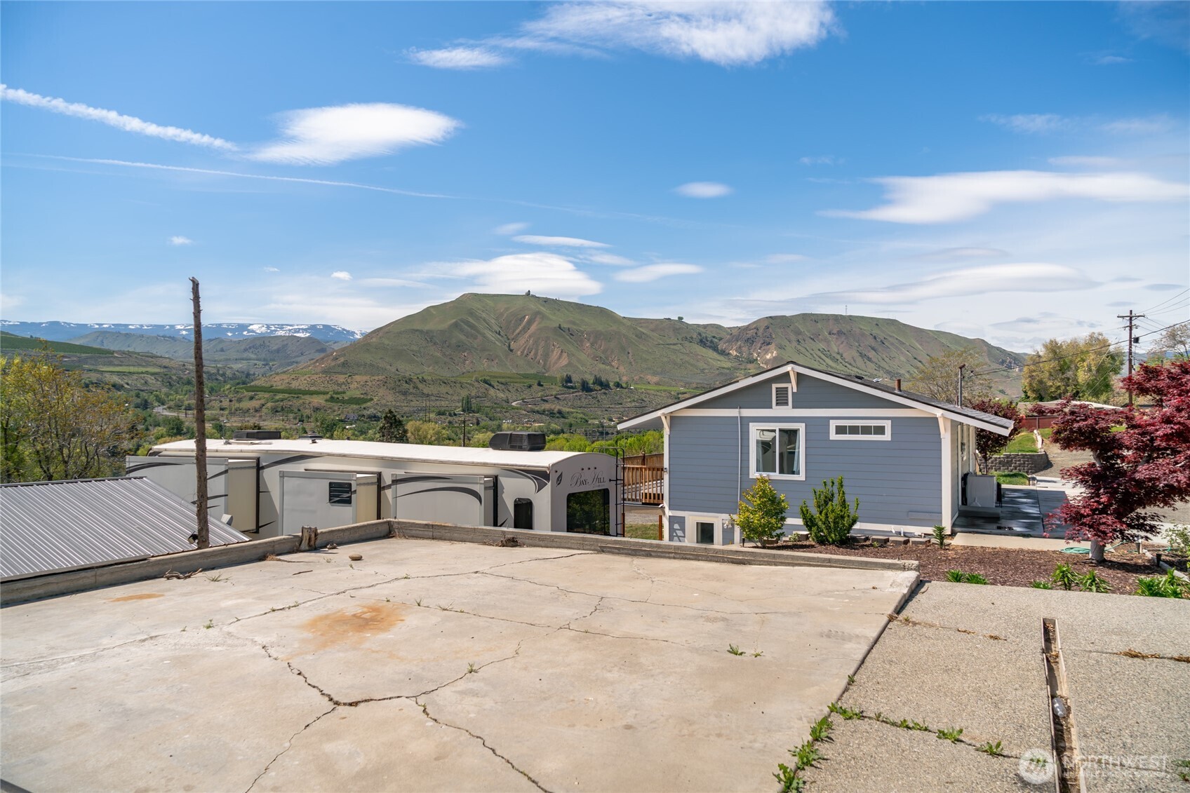 2440 Rock Island Road East Wenatchee, WA 98802 - Photo 36 of 37 a view of a house with a yard