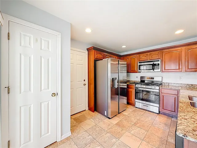 a view of room with mirror