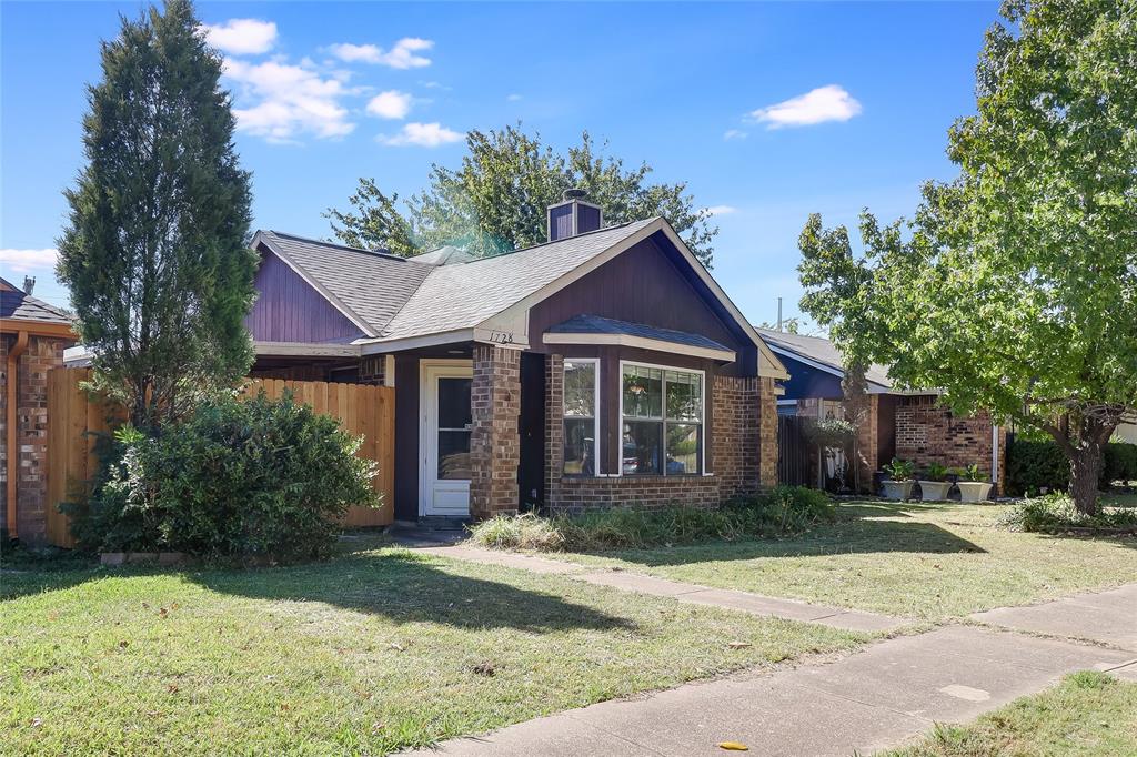 1728 Hackamore Street Mesquite, TX 75149 - Photo 2 of 22 View of front of home with a shingled roof, a chimney, and brick siding