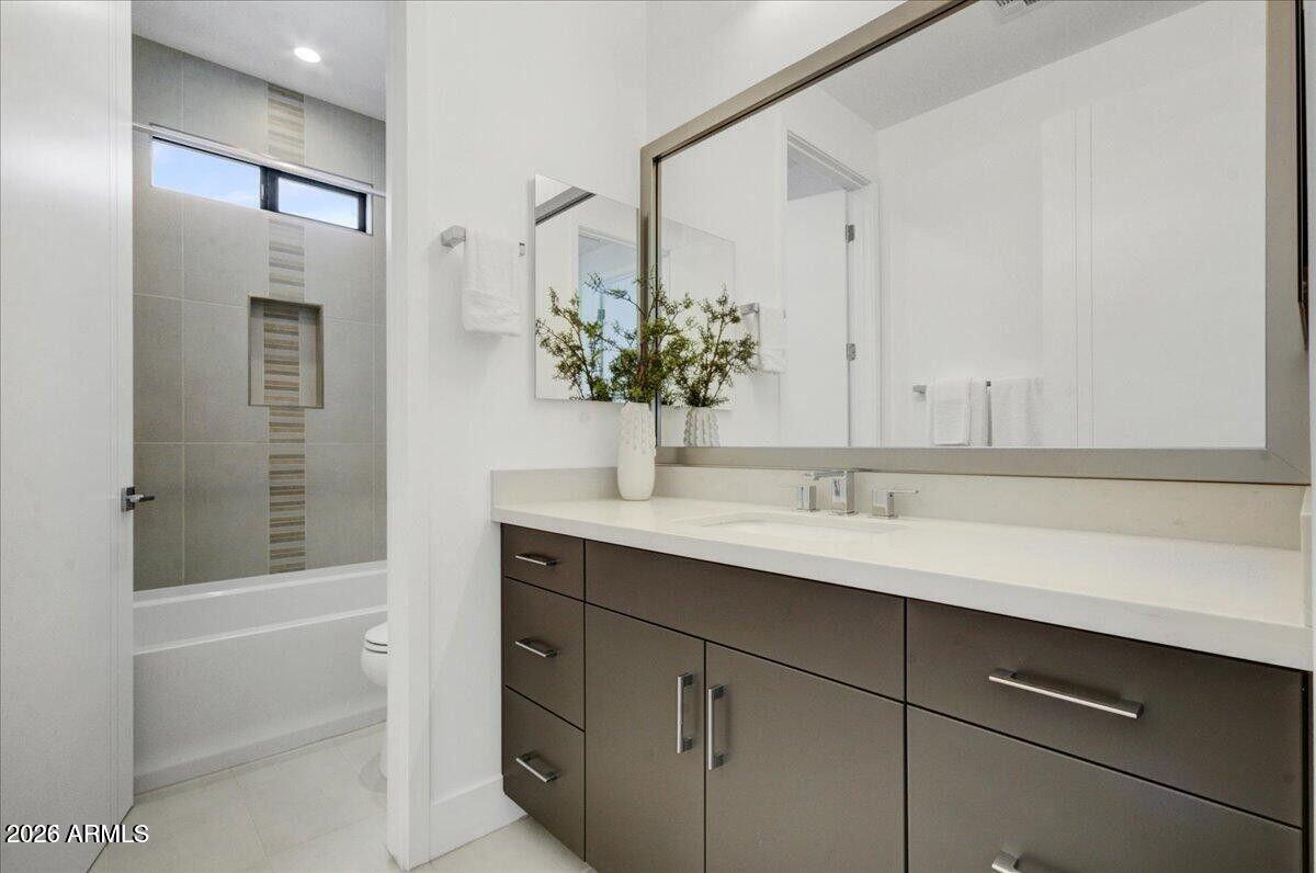 100 West Northern Avenue, Unit 6 Phoenix, AZ 85021 - Photo 22 of 26 a bathroom with a sink and a mirror