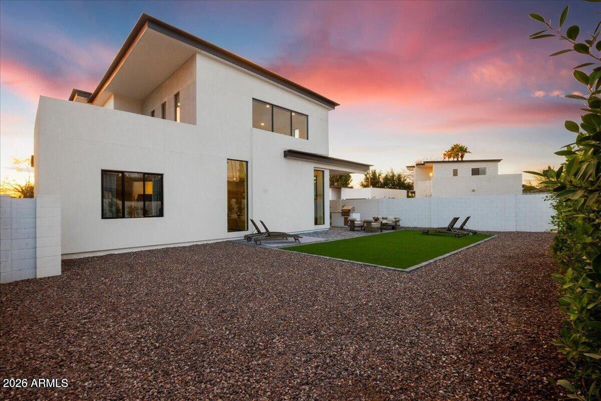 100 West Northern Avenue, Unit 6 Phoenix, AZ 85021 - Photo 24 of 26 a view of a house with a yard