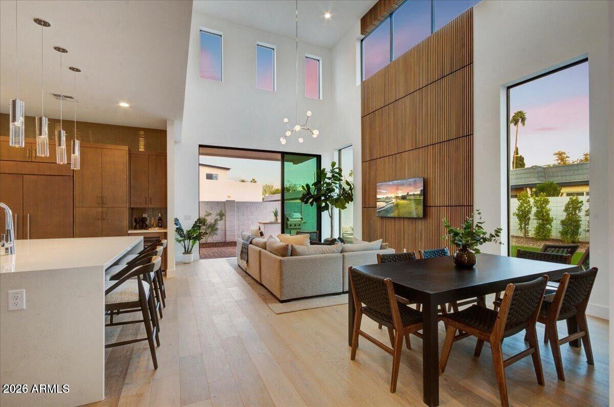 100 West Northern Avenue, Unit 6 Phoenix, AZ 85021 - Photo 4 of 26 a living room with furniture a large window and a table