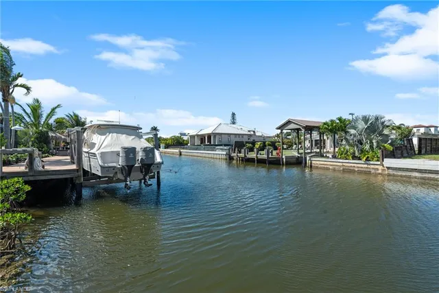 a view of a lake with sitting area