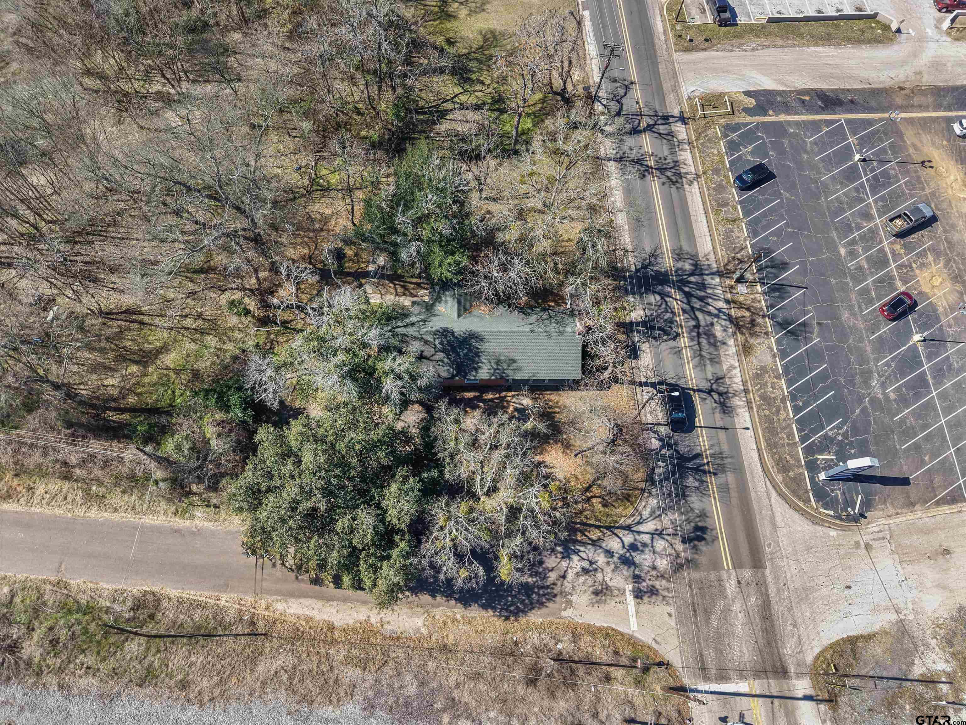 102 South Front Street Overton, TX 75684 - Photo 11 of 22 a aerial view of a house with a yard