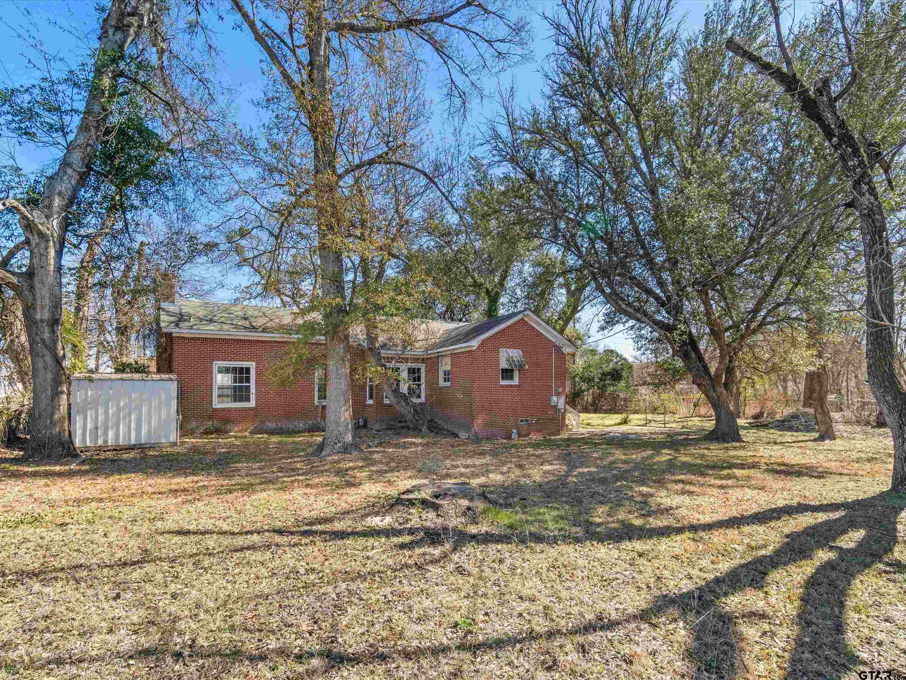 102 South Front Street Overton, TX 75684 - Photo 6 of 22 a view of a house with a yard