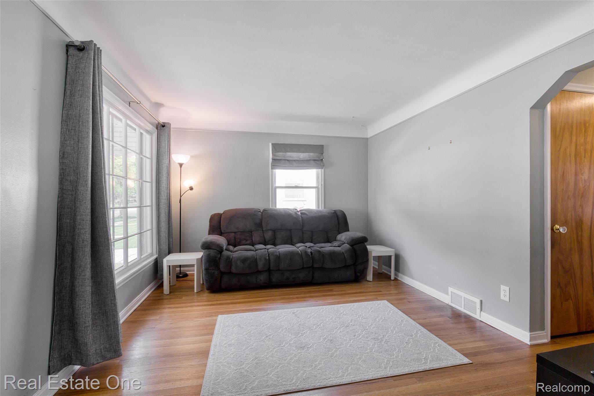 3608 Durham Road Royal Oak, MI 48073 - Photo 4 of 23 Spacious living room w/beautiful hardwood floors!