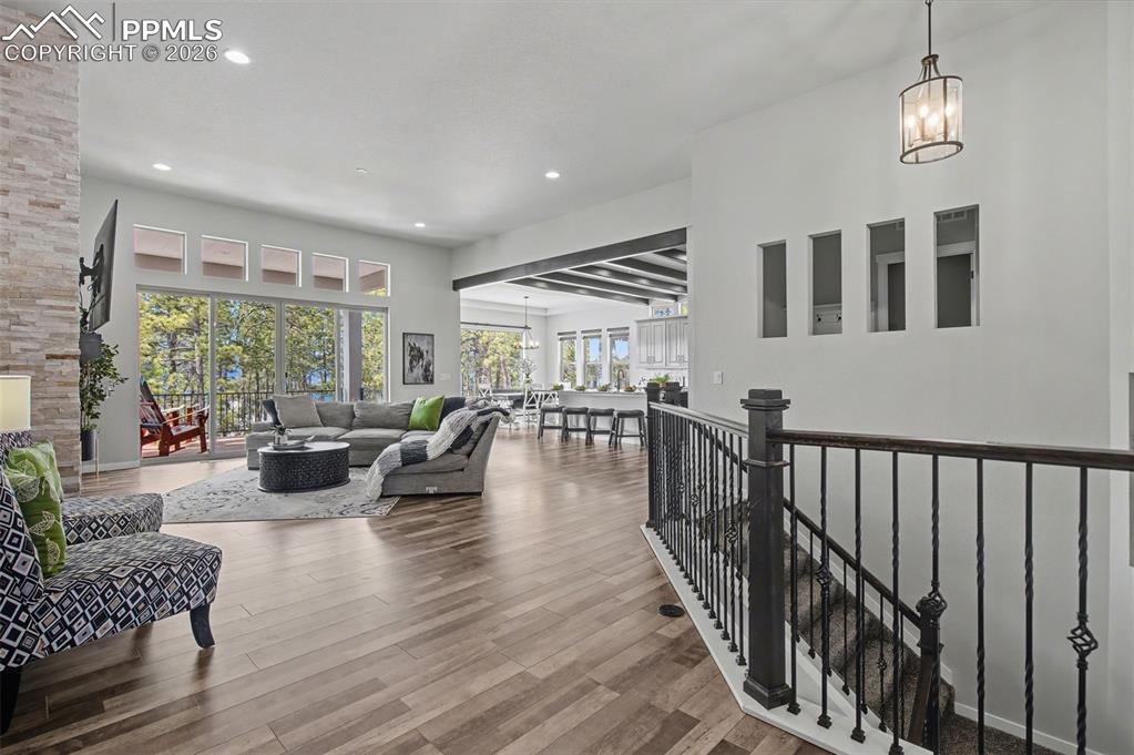 16474 Morning Rise Lane Monument, CO 80132 - Photo 11 of 49 a living room with fireplace furniture and a large window