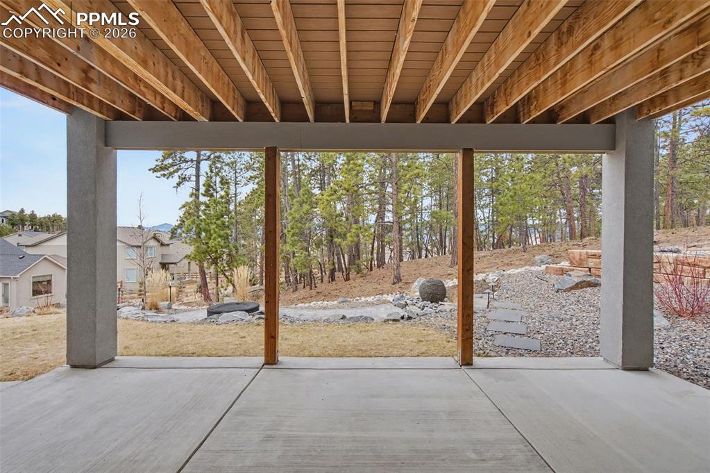 16474 Morning Rise Lane Monument, CO 80132 - Photo 44 of 49 a view of porch with a floor to ceiling window