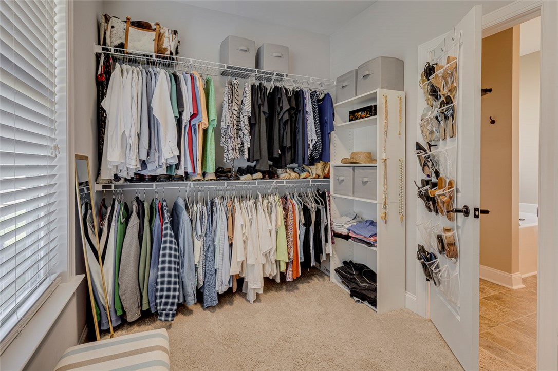203 Streams Way Anderson, SC 29625 - Photo 14 of 47 This spacious closet features ample storage solutions for an organized wardrobe.