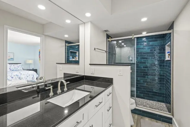 a bathroom with a sink and a mirror