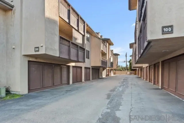 a view of a street with a building