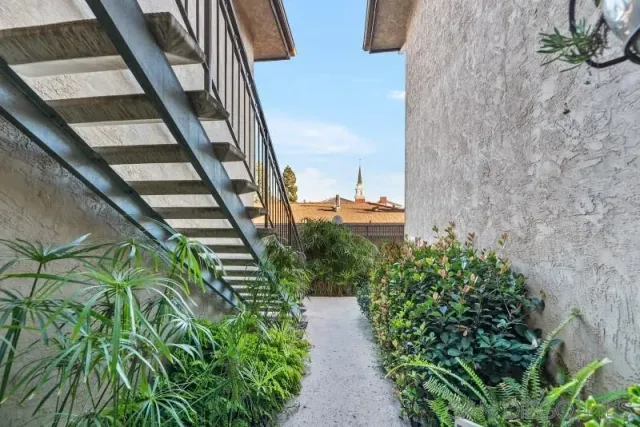 a view of a pathway both side of building