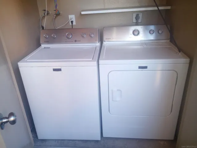 a close up view of washer and dryer