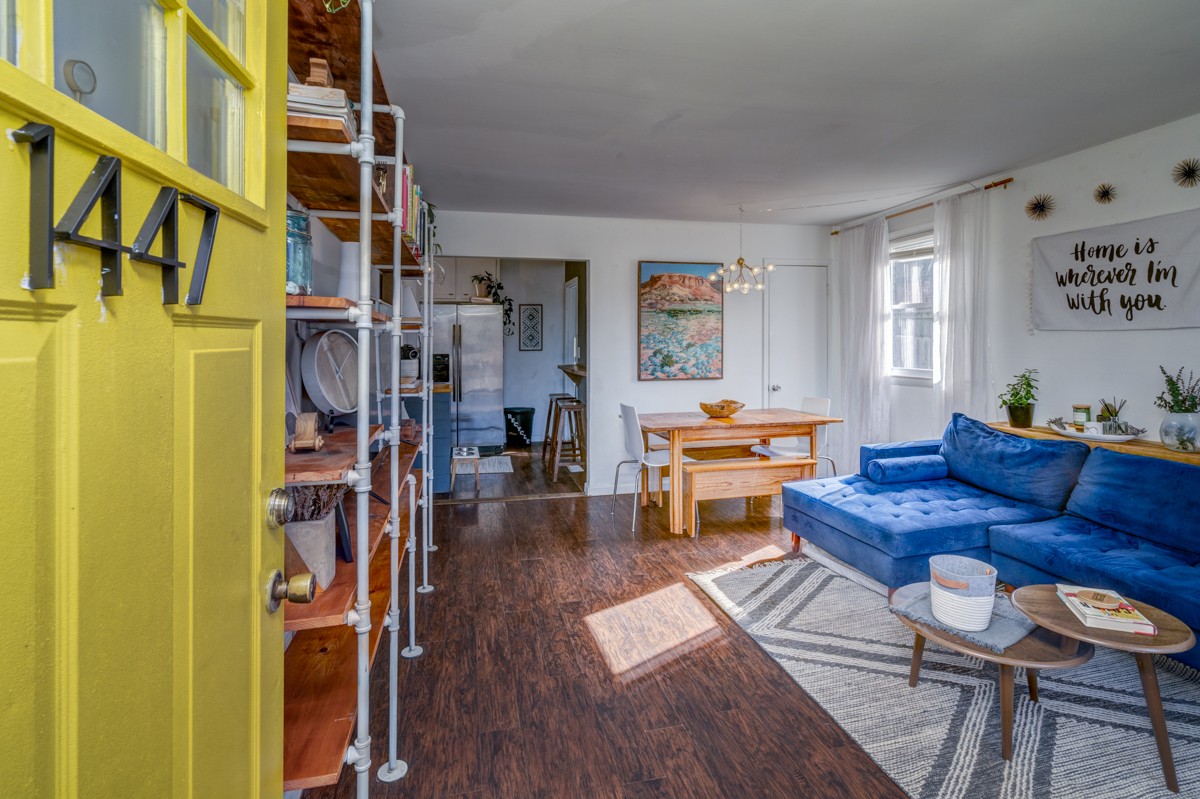 1447 Dolan Road Nashville, TN 37218 - Photo 2 of 20 a living room with furniture and a book shelf