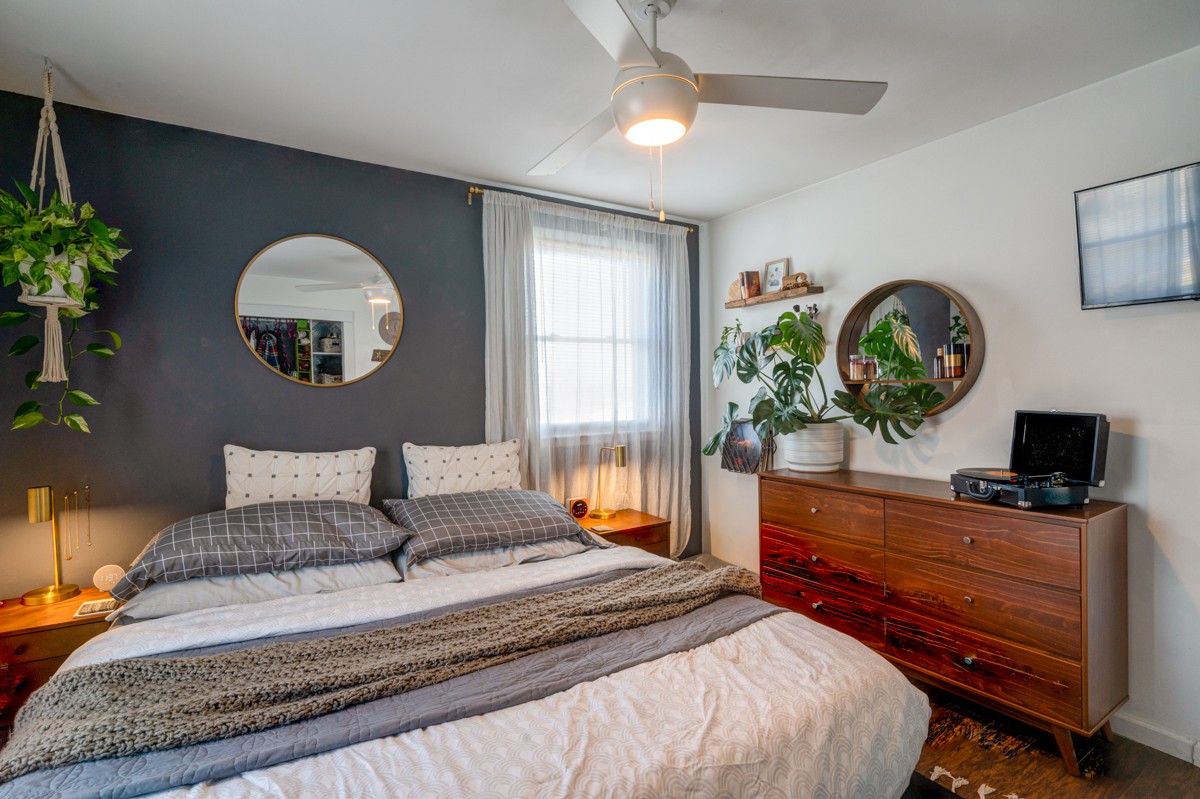 1447 Dolan Road Nashville, TN 37218 - Photo 15 of 20 a bedroom with a bed and a television