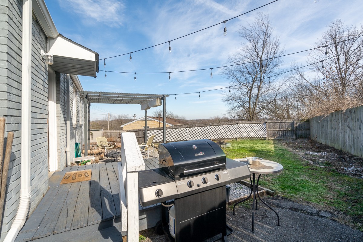 1447 Dolan Road Nashville, TN 37218 - Photo 17 of 20 a view of a patio with chairs and a grill