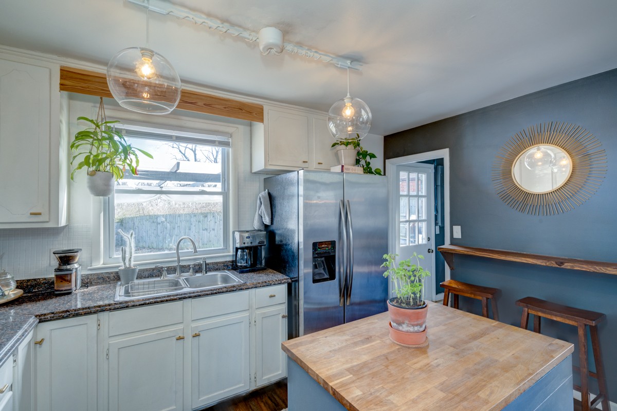 1447 Dolan Road Nashville, TN 37218 - Photo 8 of 20 a kitchen with refrigerator and window
