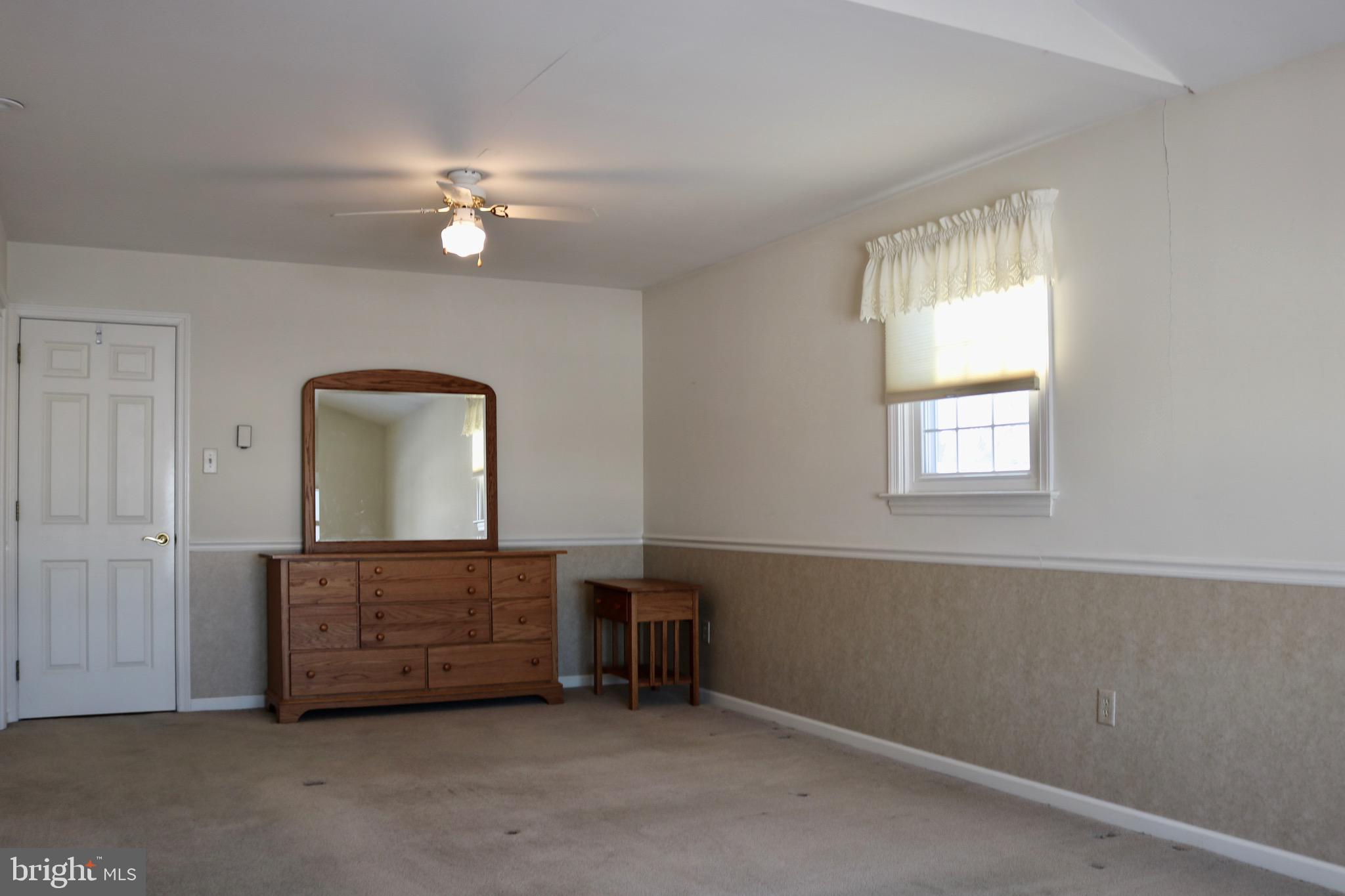 1386 Landisville Road Manheim, PA 17545 - Photo 13 of 26 a living room with furniture and a window