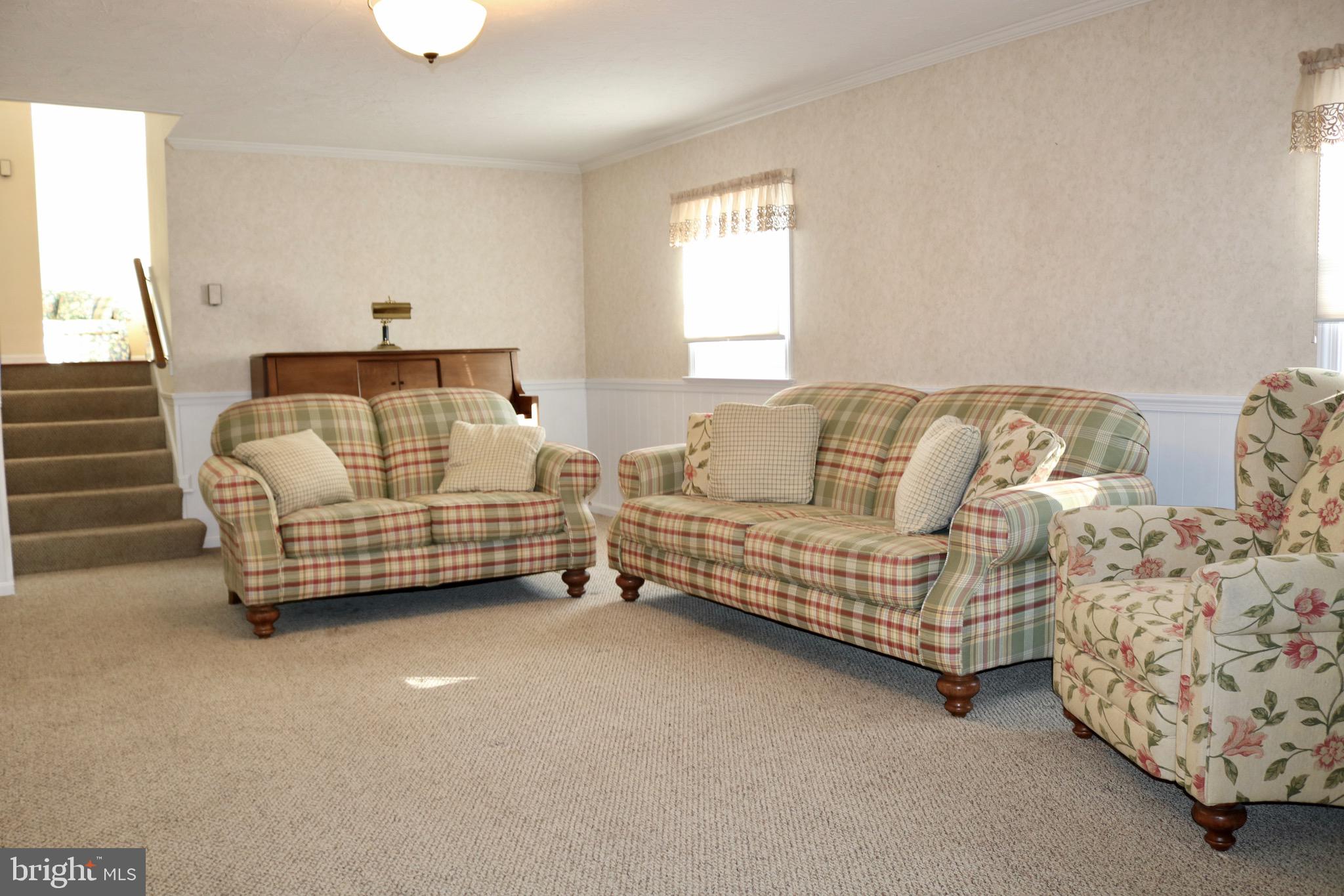 1386 Landisville Road Manheim, PA 17545 - Photo 20 of 26 a bedroom with a bed and a couch