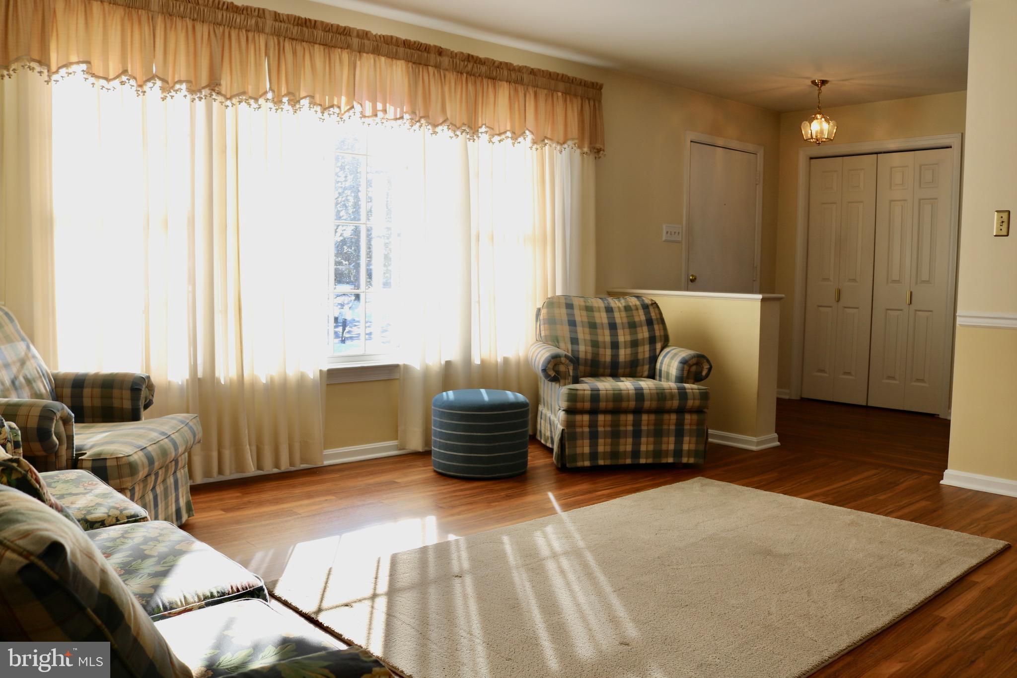 1386 Landisville Road Manheim, PA 17545 - Photo 2 of 26 a bedroom with furniture and a large window