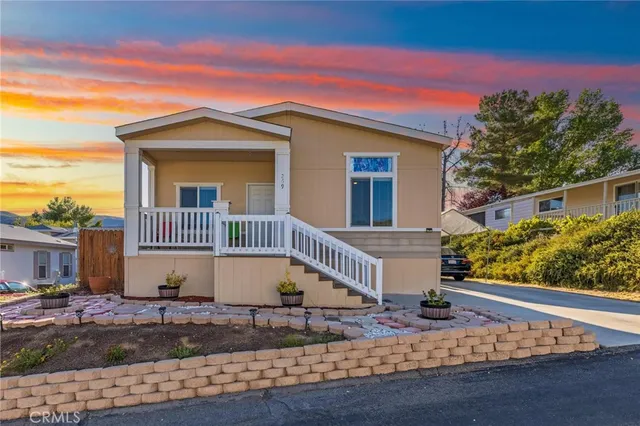 a front view of a house with porch