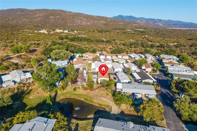 an aerial view of residential house and outdoor space