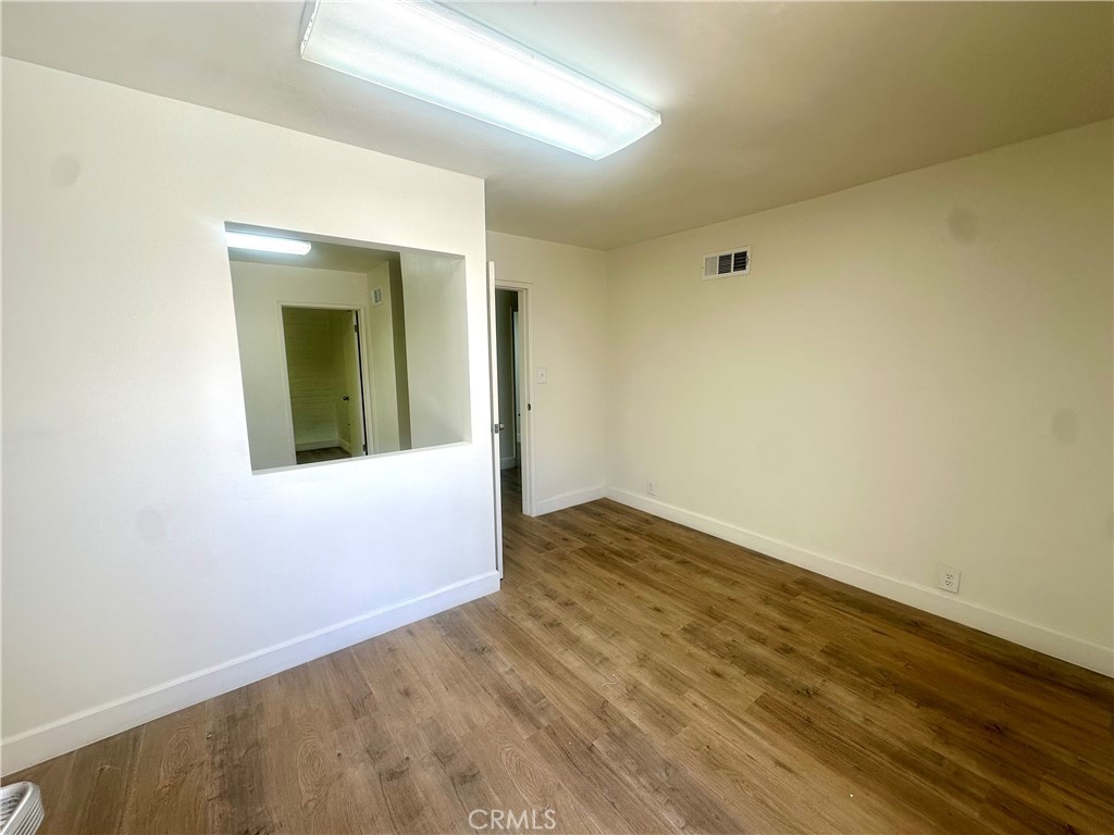 815 South Main Street Corona, CA 92882 - Photo 15 of 24 a view of an empty room and wooden floor