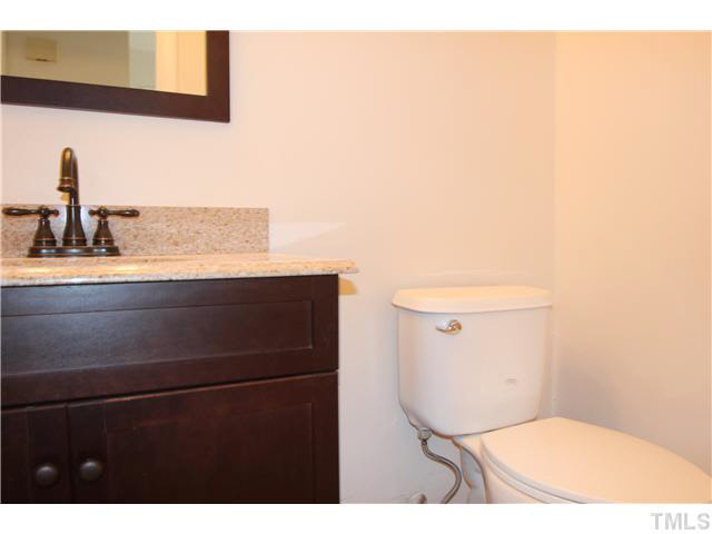 305 Southwest Maynard Road Cary, NC 27511 - Photo 8 of 15 Updated half bath with new vanity