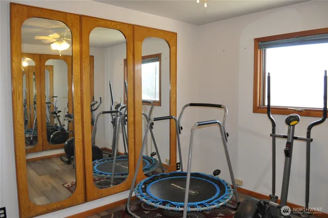 a bathroom with a toilet sink and shower