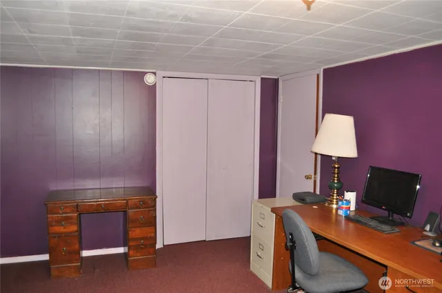 a workspace with furniture and lamp