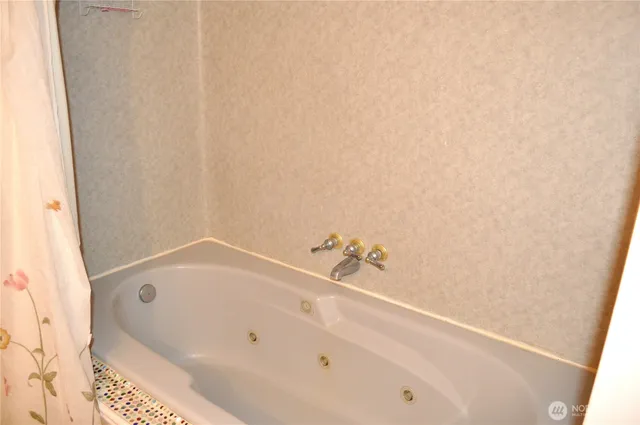 a bathroom with a bathtub