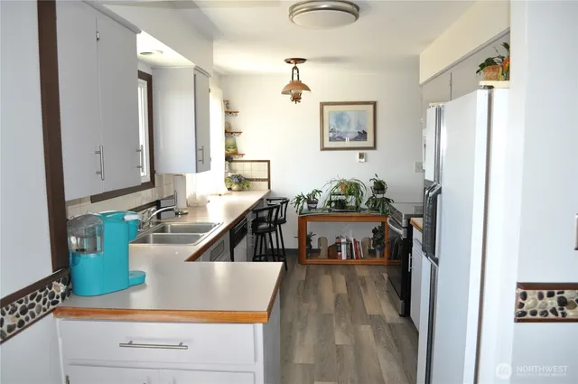 a view of a living room and bathroom