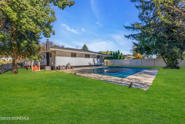 a view of a house with a big yard