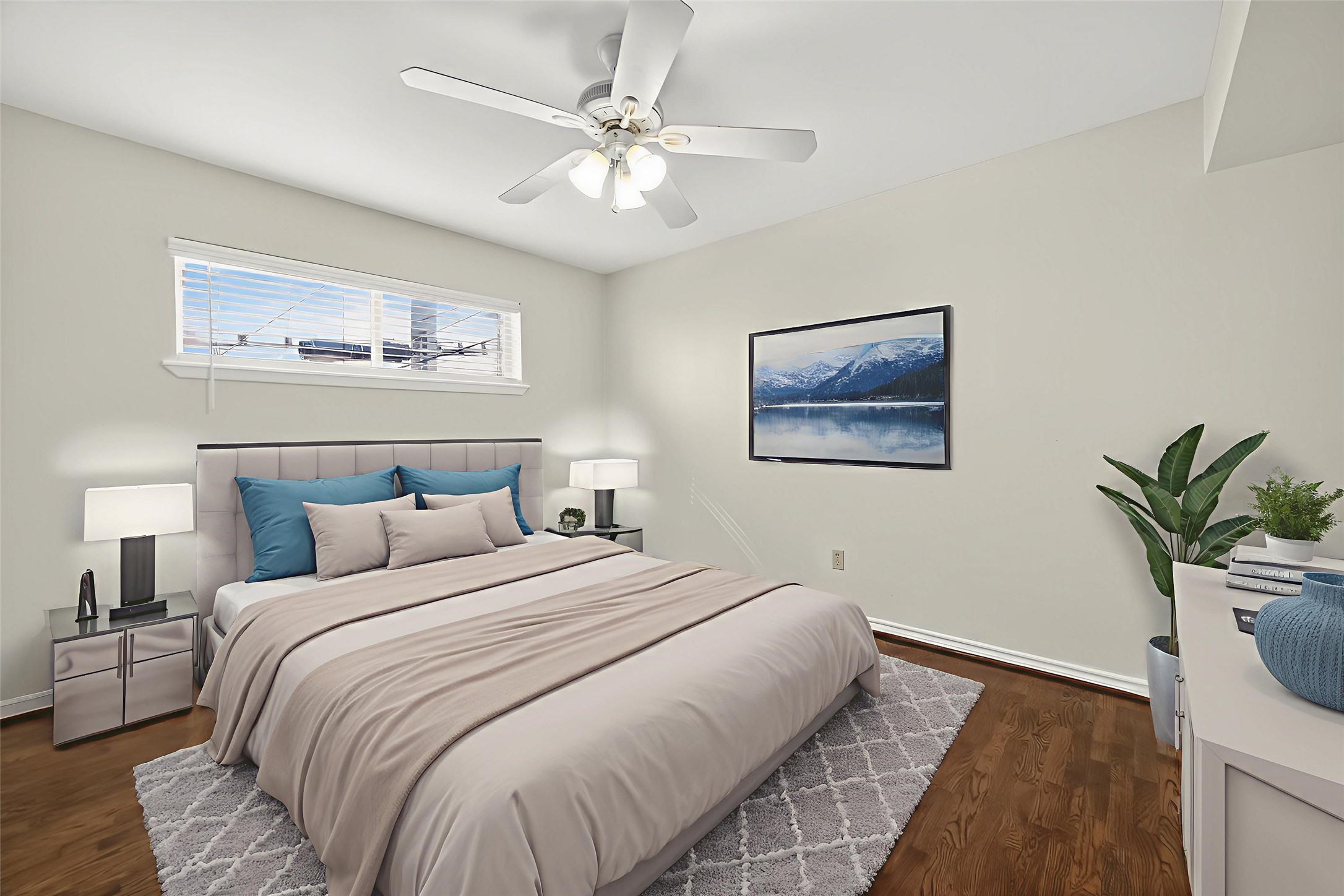 2020 Huldy Street, Unit 10 Houston, TX 77019 - Photo 20 of 24 a bedroom with a large bed and a chandelier