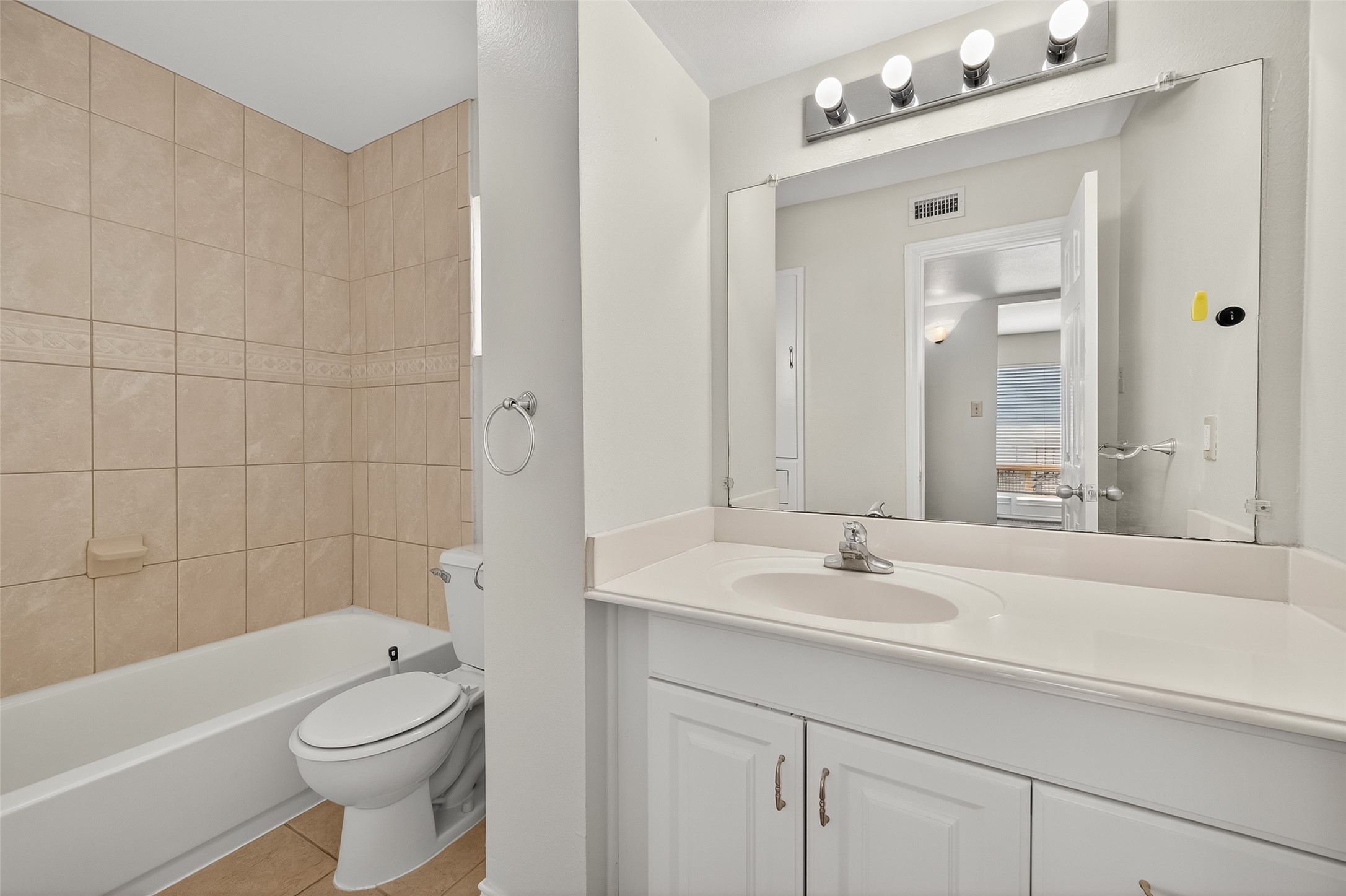 2020 Huldy Street, Unit 10 Houston, TX 77019 - Photo 24 of 24 a bathroom with a sink a toilet and shower