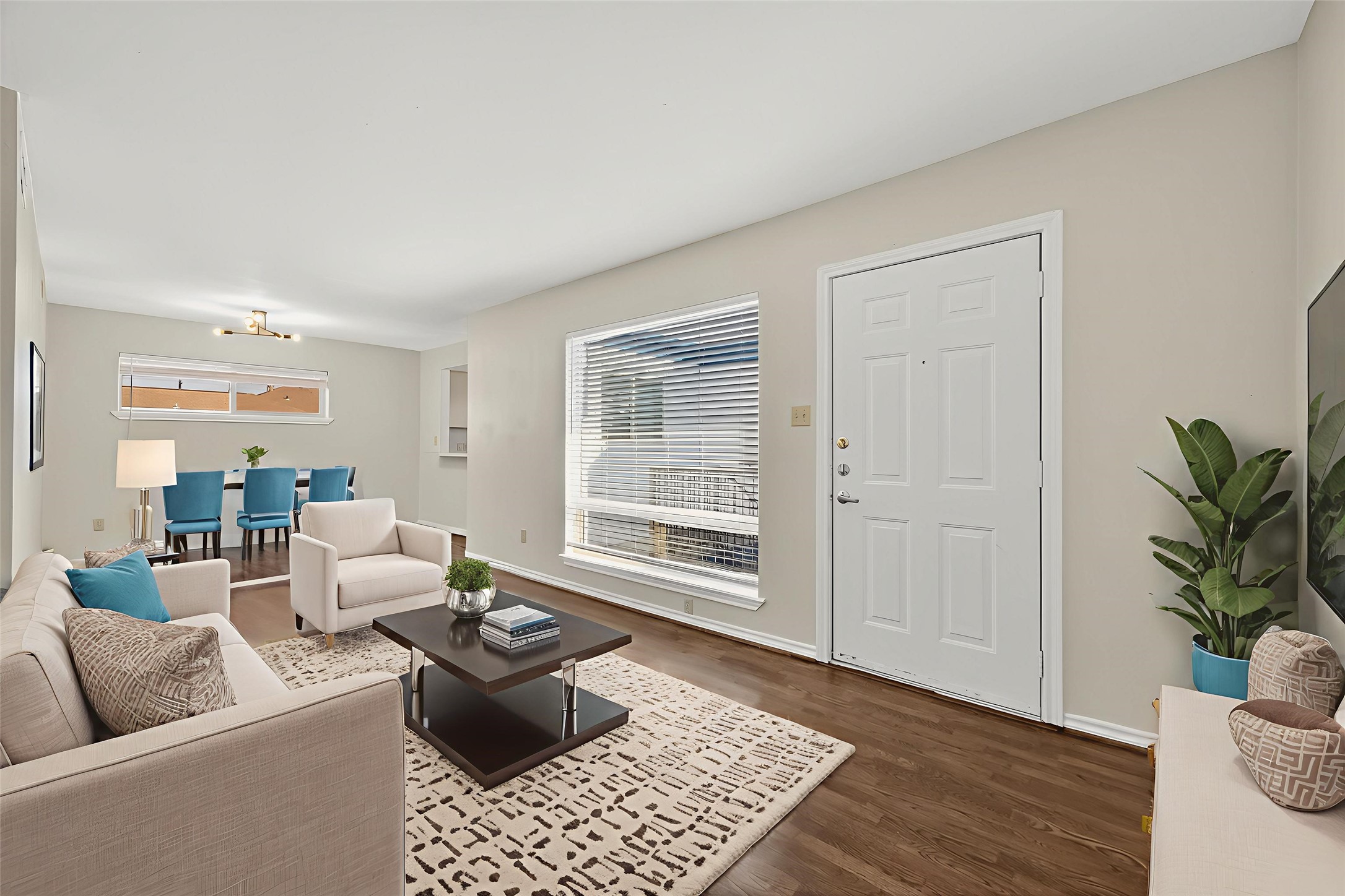 2020 Huldy Street, Unit 10 Houston, TX 77019 - Photo 10 of 24 a living room with furniture and a potted plant