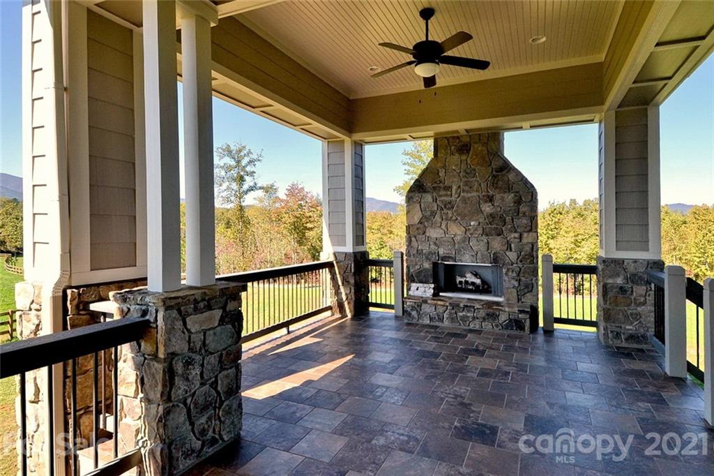 352 Windflower Ln Mill Spring Tryon, NC 28782 - Photo 15 of 43 a view of an entryway with a fireplace