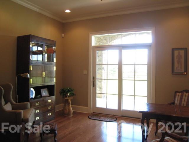 352 Windflower Ln Mill Spring Tryon, NC 28782 - Photo 19 of 43 a living room with furniture and a window
