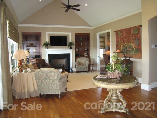 352 Windflower Ln Mill Spring Tryon, NC 28782 - Photo 32 of 43 a living room with furniture and a fireplace